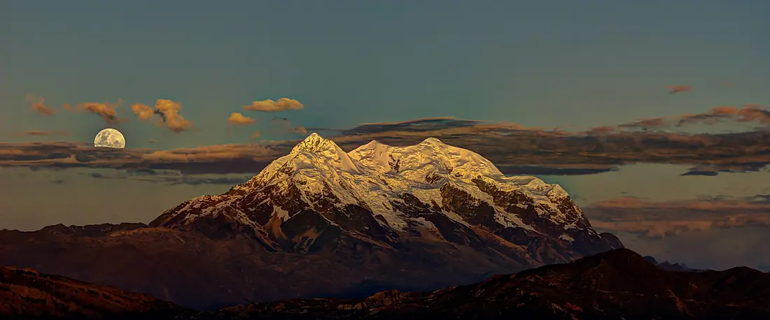 Illimani with the full moon rising overhead