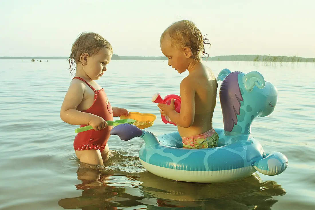In water with toys